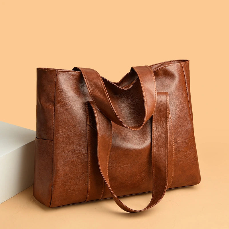 sac_a_main_Ezia-_Cuir_Marron