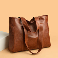 sac_a_main_Ezia-_Cuir_Marron