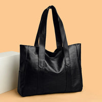sac_a_main_Ezia-_Cuir_Noir-monsacparis