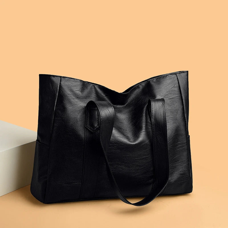 sac_a_main_Ezia-_Cuir_Noir